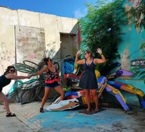 Street lined with murals in the San Nicolas art district, Aruba